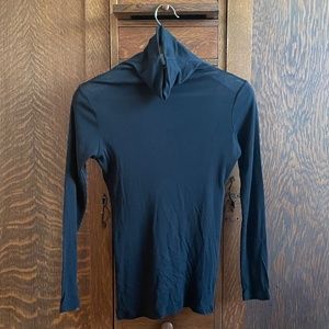 NewMan black turtleneck